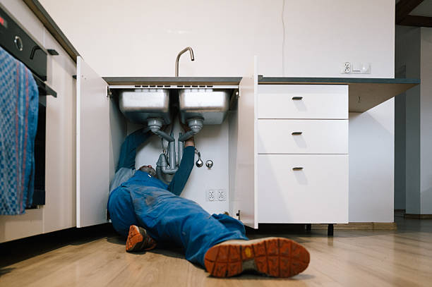 Professional Drain Cleaning technician working in Ames, IA